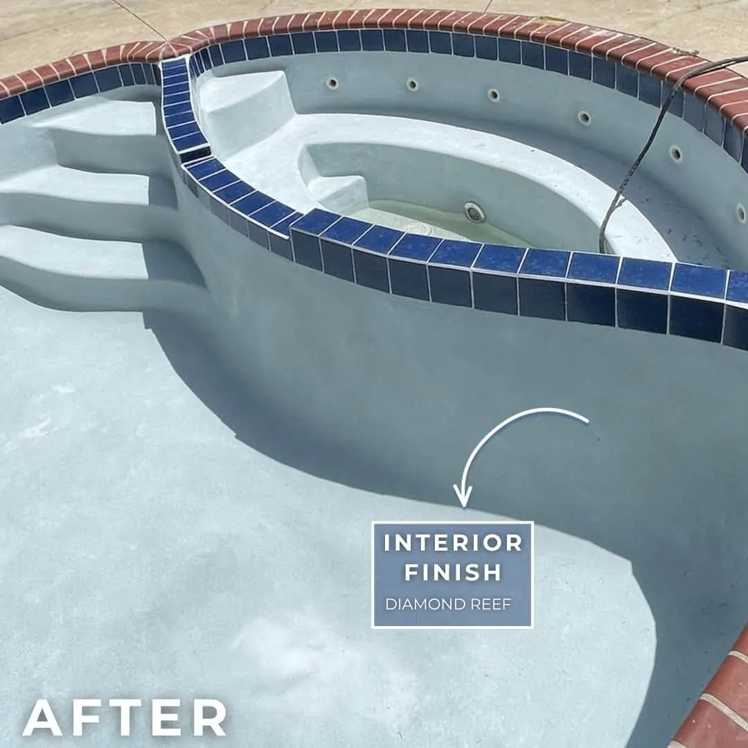 Pool tanning ledge finished with waterline tile and a smooth interior
